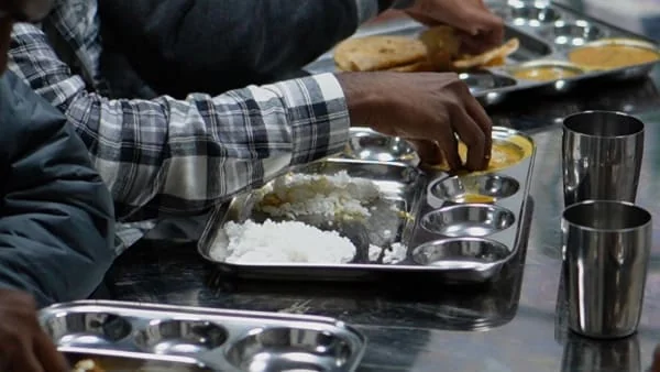 Clean buffet counter with vegetarian and non-vegetarian selections