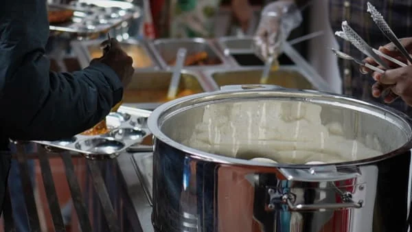 Fresh rotis, dal, paneer, rice, and vegetable curries